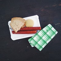 Classic Czech sausage with bread and Mustard