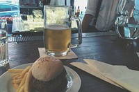 Burger with beer in restaurant