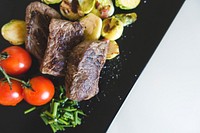 A beef steaks with vegetables
