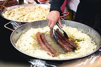Sausages with onion at a market