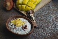 Exotic coconut porridge with beans and mango