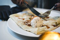 Crepe with ice cream topped with hot caramel