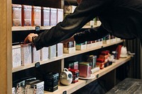Customer choosing tea in a tea shop