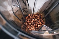 Closeup of hazelnuts in a mixer