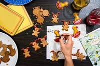 Woman decorating Easter gingerbread food photography