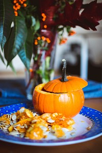 Carving a pumpkin for Halloween decoration
