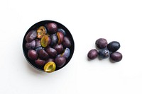 Fresh plums on a table