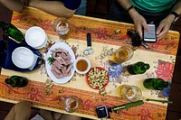 Enjoying Vietnamese beer and snacks