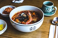 Korean Chinese seafood soup noodle in a restaurant