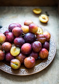 Food photography of fresh plums. Visit <a href="https://monikagrabkowska.com/" target="_blank">Monika Grabkowska</a> to see more of her food photography.