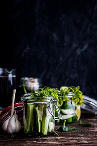 Homemade pickled cucumbers in a jar. Visit <a href="https://monikagrabkowska.com/" target="_blank">Monika Grabkowska</a> to see more of her food photography.