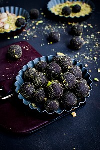 Dark chocolate pralines with pistachios. Visit <a href="https://monikagrabkowska.com/" target="_blank">Monika Grabkowska</a> to see more of her food photography.