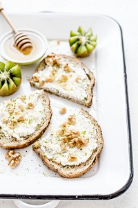 Toasted chia bread with white cheese, walnuts, honey and lime drizzle. Visit <a href="https://monikagrabkowska.com/" target="_blank">Monika Grabkowska</a> to see more of her food photography.