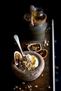 Greek yoghurt with coconut granola. Visit <a href="https://monikagrabkowska.com/" target="_blank">Monika Grabkowska</a> to see more of her food photography.