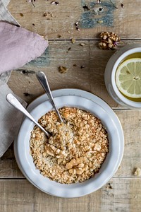 Breakfast bowl with granola and walnuts. Visit Monika Grabkowska to see more of her food photography.