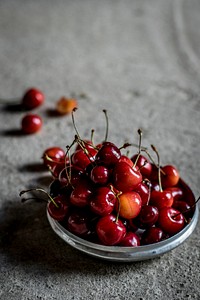 Bowl of fresh and sweet cherries. Visit Monika Grabkowska to see more of her food photography.