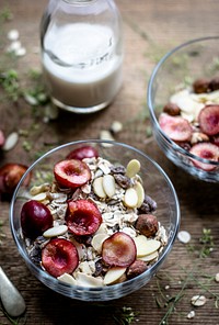 Breakfast granola bowl with fresh cherries. Visit <a href="https://monikagrabkowska.com/" target="_blank">Monika Grabkowska</a> to see more of her food photography.