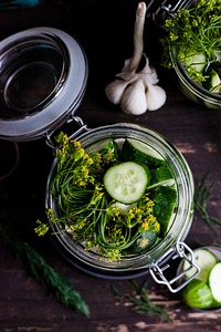 Jar of homemade pickles in dill. Visit Monika Grabkowska to see more of her food photography.