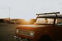 Red vintage car in the morning sun