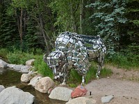 Lou Wille&#39;s &quot;Chrome on the Range&quot; sculpture in the John Denver Sanctuary, named for the popular singer who lived in and sang about Colorado, in the old mining town of Aspen -- now a popular arts and skiing destination.