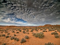 Cotton ball-like clouds drift over the remote terrain near the northern Arizona town of Page. Original image from Carol M. Highsmith&rsquo;s America, Library of Congress collection. Digitally enhanced by rawpixel.
