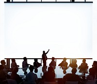 Business people&#39;s silhouette with a big mockup white board