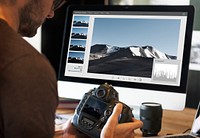 Photographer working on a computer