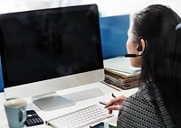 Customer service worker with an empty screen computer