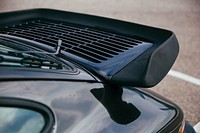 Massive wing that aids cooling this fast car. Fresh air for the rare air cooled Porsche engine.