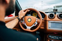 Free man enjoying a fast drive in an Italian sports car, public domain car CC0 photo.