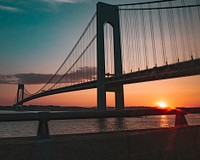 Free long double-decker suspension bridge connects Staten Island to Brooklyn in New York City at dusk image, public domain New York travel and sightseeing CC0 photo.