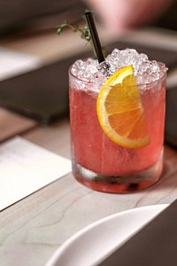 Free refreshing pink summer cocktail with lemon slice photo, public domain beverage CC0 image.