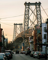 New York street under a bridge at dusk.