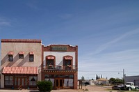 Two downtown buildings, including the old Avenue Hotel, right &mdash; now (2019) a bed-and-breakfast inn that celebrated its 100-year birthday in 2015 &mdash; in Douglas, a small border city with Mexico in the southeastern corner of Arizona.