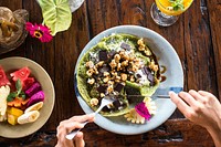 Girl eating matcha pancakes. nuts and fruits. Free public domain CC0 photo.