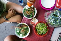 Eating Vietnamese soup with chicken balls, free public domain CC0 photo.