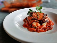Free eggplant cannelloni, white plate photo, public domain food CC0 image.