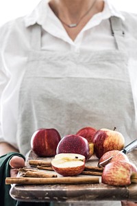 Free woman holding apple image, public domain fruit CC0 photo.