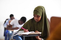 Secondary students take their national examinations in Mogadishu, Somalia, on 22 May 2018. Original public domain image from Flickr