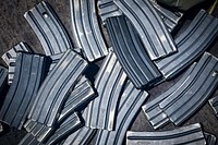 MEDITERRANEAN SEA. M4 rifle magazines lay on the deck aboard the Arleigh Burke-class guided-missile destroyer USS Porter (DDG 78) during a live-fire qualification course, May 23, 2018.