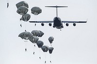 U.S. Army paratroopers, military jet. Original public domain image from Flickr