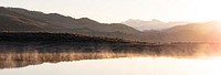 Steam from ephemeral ponds lit up at sunrise. Original public domain image from Flickr