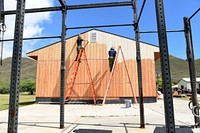 Workers constructing the gym at Bellows Air Force Station, Waimanalo, Hawaii. Original public domain image from Flickr