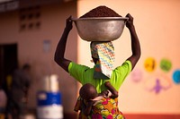 USAID in Ghana: Shea Butter Processing. USAID and the Global Shea Alliance partner to connect West Africa village women to the global marketplace. Photo: Douglas Gritzmacher/USAID. Original public domain image from Flickr