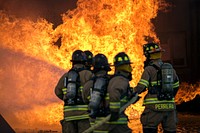 Firefighters assigned to the U.S. Air Force 23rd Civil Engineer Squadron (CES) extinguish an aircraft fire during live-fire training, April 24, 2018, at Moody Air Force Base, Georgia.