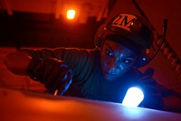 MEDITERRANEAN SEA (May 28, 2018) Aviation Structural Mechanic 2nd Class Autumn Karas, assigned to the &ldquo;Fighting Checkmates&rdquo; of Strike Fighter Squadron (VFA) 211, performs maintenance on a F/A-18F Super Hornet in the hangar bay aboard the Nimitz-class aircraft carrier USS Harry S. Truman (CVN 75).