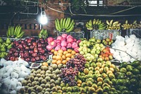 Variety of fresh fruits on organic food night market.