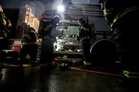 Fighterfighters prepare their gear prior to live burn training at the Anthony "Tony" Canale Training Center in Egg Harbor Township, N.J., Sept. 18, 2018.