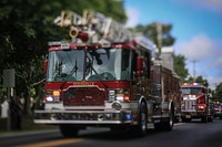 Fire truck parade. Original public domain image from Flickr