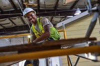 U.S. Air Force Airman 1st Class Jay Niles, an operations manager assigned to the 169th Civil Engineer Squadron, constructs a home for a Native American veteran during the “Deployment for Training” mission to Gallup, New Mexico, July 17, 2018.